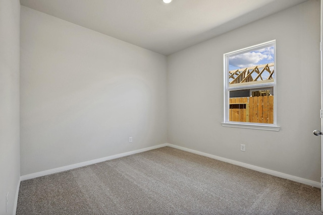 10347 Red Cardinal Dr, Cleveland, TX 77328 - carpeted spare room with baseboards
