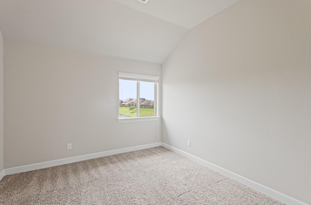 2131 Cranbrook Ridge Ln, Sugar Land, TX 77479 - carpeted spare room featuring lofted ceiling and baseboards