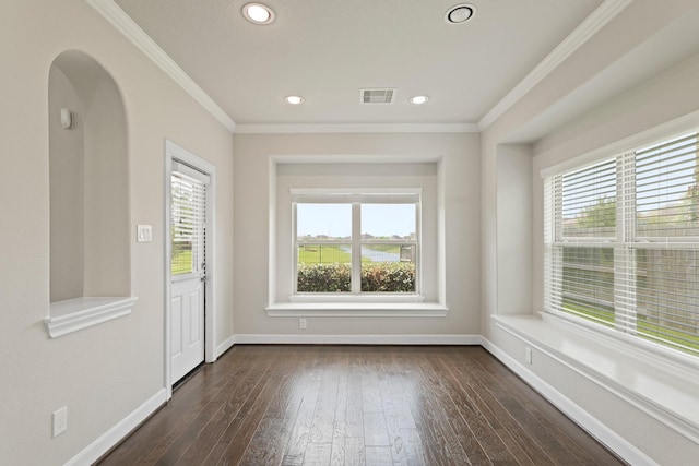 2131 Cranbrook Ridge Ln, Sugar Land, TX 77479 - empty room with healthy amount of natural light, dark wood-type flooring, baseboards, crown molding, and recessed lighting