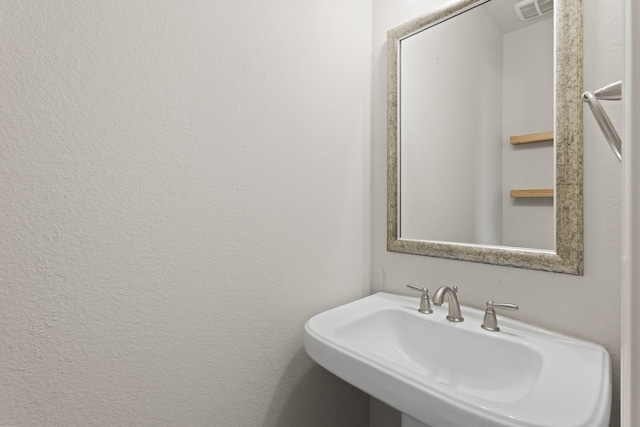 2131 Cranbrook Ridge Ln, Sugar Land, TX 77479 - bathroom with a sink and a textured wall
