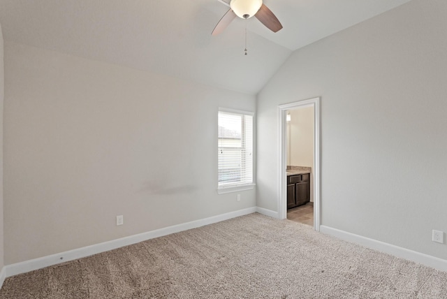2131 Cranbrook Ridge Ln, Sugar Land, TX 77479 - spare room featuring a ceiling fan, vaulted ceiling, light carpet, and baseboards