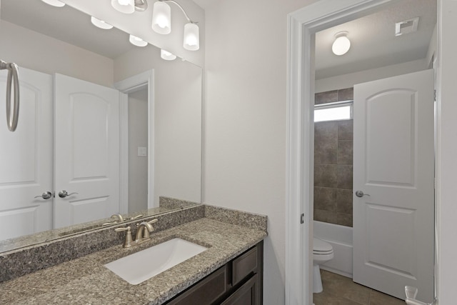 2131 Cranbrook Ridge Ln, Sugar Land, TX 77479 - bathroom featuring vanity, tile patterned floors, toilet, and shower / tub combination