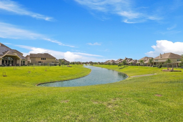 2131 Cranbrook Ridge Ln, Sugar Land, TX 77479 - view of community featuring a water view, a lawn, and a residential view