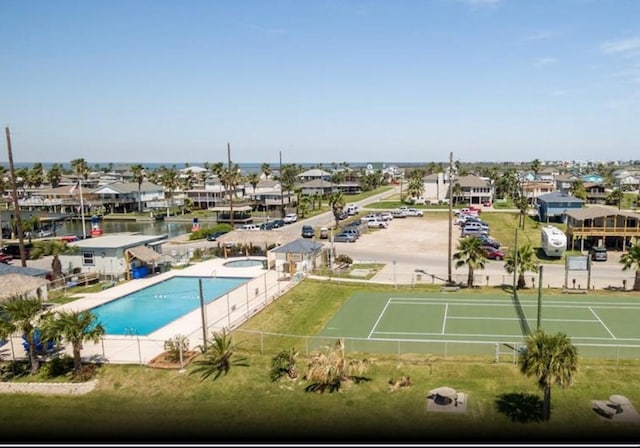 4126 Fort Bend Dr, Galveston, TX 77554 - drone / aerial view of a pool