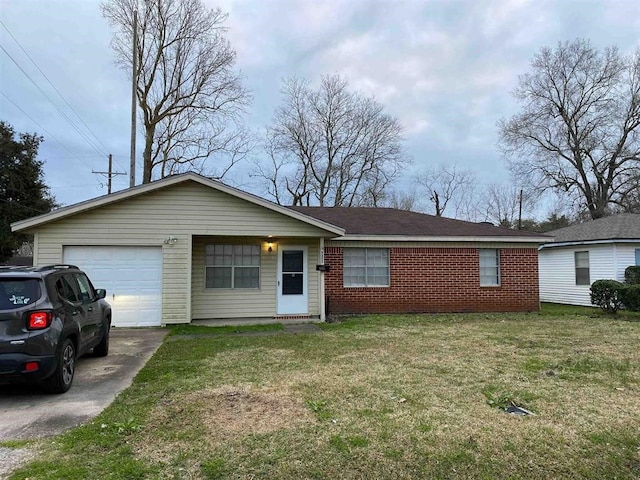 9305 Gardner St, Beaumont, TX 77707 - ranch-style home with an attached garage, concrete driveway, a front yard, and brick siding