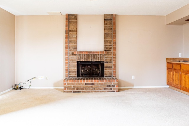 6619 Stonechase, Houston, TX 77084 - unfurnished living room featuring light colored carpet, a fireplace, and baseboards