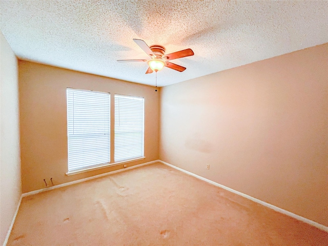 6619 Stonechase, Houston, TX 77084 - carpeted empty room featuring a ceiling fan and baseboards