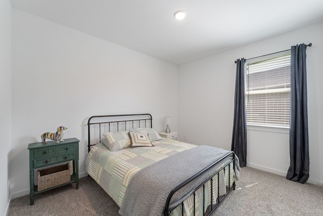 14027 Valley Creek Ct, Conroe, TX 77384 - carpeted bedroom with baseboards