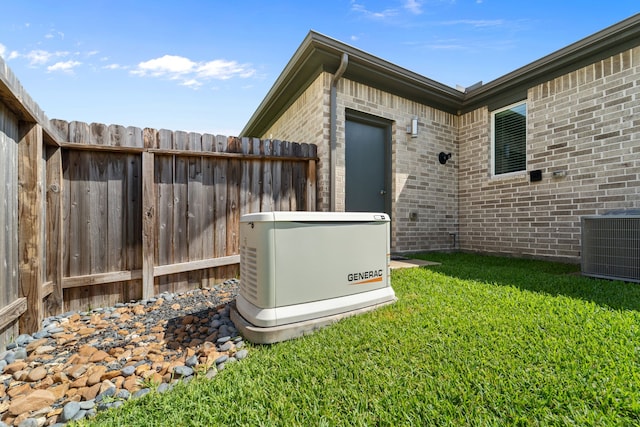 14027 Valley Creek Ct, Conroe, TX 77384 - exterior view of a power unit, brick siding, and cooling unit