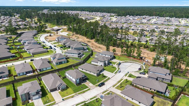 14027 Valley Creek Ct, Conroe, TX 77384 - aerial view of property's location with nearby suburban area and a forest