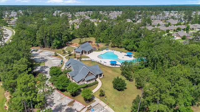 14027 Valley Creek Ct, Conroe, TX 77384 - aerial view of property's location featuring a pool and nearby suburban area