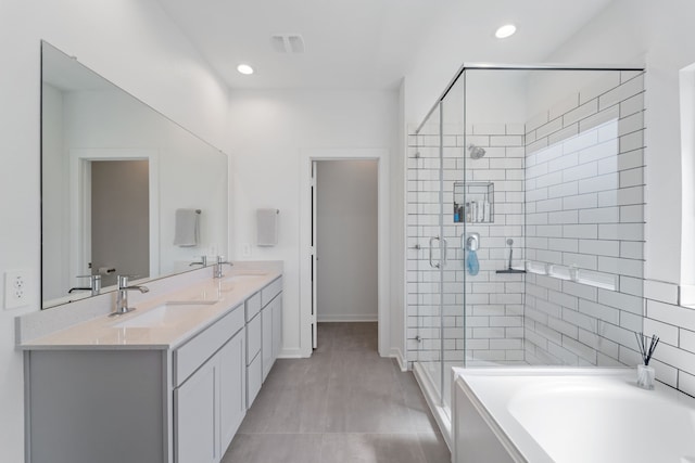14027 Valley Creek Ct, Conroe, TX 77384 - full bath featuring a shower stall, double vanity, a garden tub, recessed lighting, and baseboards
