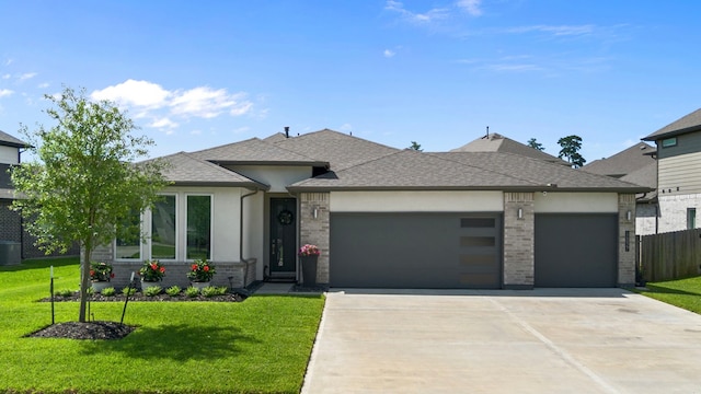 14027 Valley Creek Ct, Conroe, TX 77384 - view of front of home with a garage, driveway, central AC unit, roof with shingles, and stucco siding