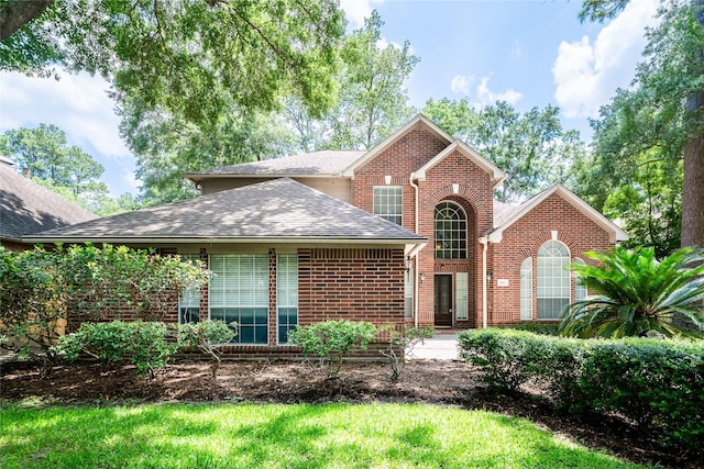 8907 Opus Ct, Houston, TX 77040 - view of front facade featuring brick siding and a shingled roof