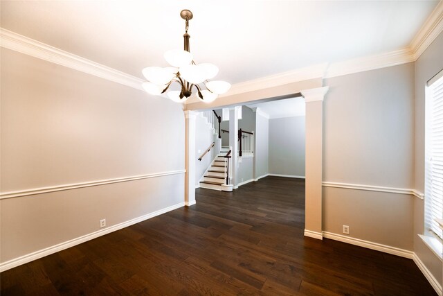 8907 Opus Ct, Houston, TX 77040 - empty room featuring a chandelier, crown molding, wood finished floors, baseboards, and decorative columns