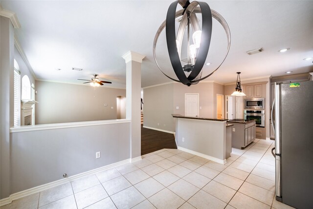 8907 Opus Ct, Houston, TX 77040 - kitchen with appliances with stainless steel finishes, ceiling fan, dark countertops, ornamental molding, and baseboards