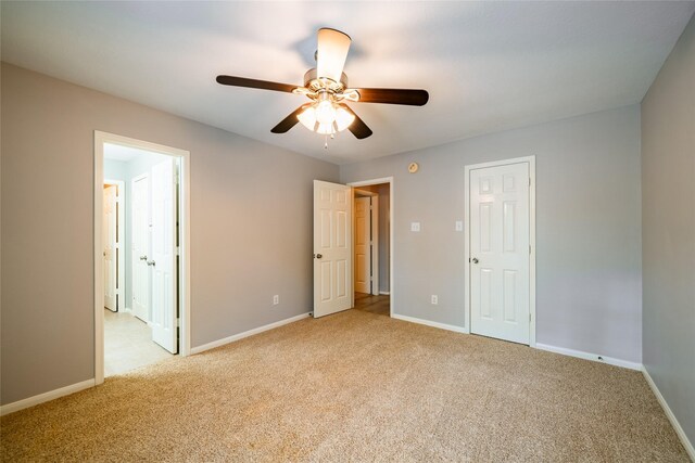 8907 Opus Ct, Houston, TX 77040 - unfurnished bedroom featuring light colored carpet, baseboards, and ensuite bath