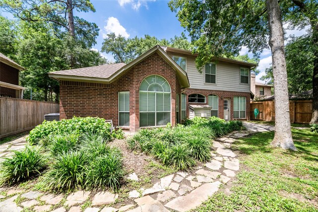 8907 Opus Ct, Houston, TX 77040 - view of front of home featuring brick siding