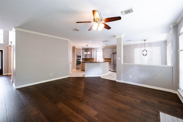 8907 Opus Ct, Houston, TX 77040 - unfurnished living room with a ceiling fan, crown molding, baseboards, and wood finished floors