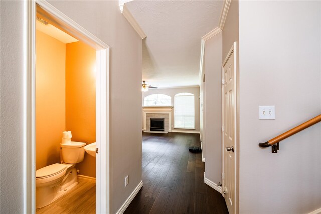 8907 Opus Ct, Houston, TX 77040 - hallway featuring dark wood-style flooring and baseboards