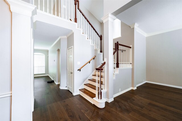 8907 Opus Ct, Houston, TX 77040 - stairs with ornamental molding, wood finished floors, and baseboards