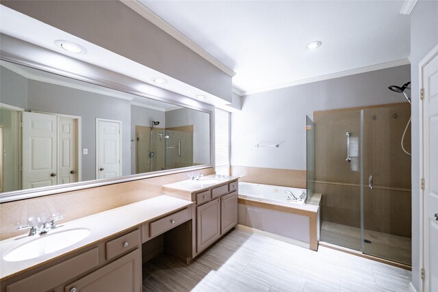 8907 Opus Ct, Houston, TX 77040 - full bath featuring a shower stall, double vanity, a bath, ornamental molding, and recessed lighting
