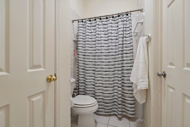 13406 Nottoway Cir, Cypress, TX 77429 - full bathroom with tile patterned floors, toilet, and a shower with shower curtain