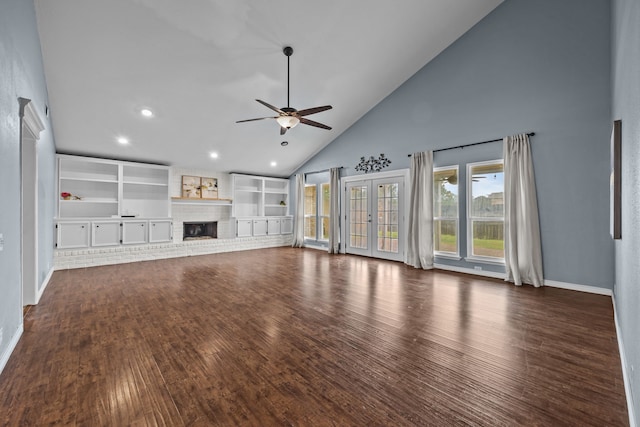 4322 Shady Springs Dr, Pasadena, TX 77586 - unfurnished living room with high vaulted ceiling, a ceiling fan, a fireplace, wood finished floors, and baseboards