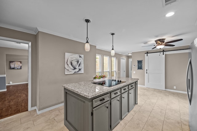 4322 Shady Springs Dr, Pasadena, TX 77586 - kitchen with a barn door, black electric cooktop, crown molding, baseboards, and hanging light fixtures