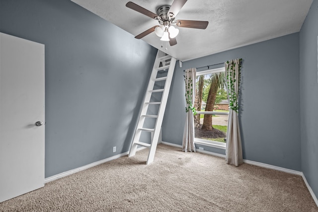 4322 Shady Springs Dr, Pasadena, TX 77586 - carpeted spare room with a ceiling fan, baseboards, and a textured ceiling