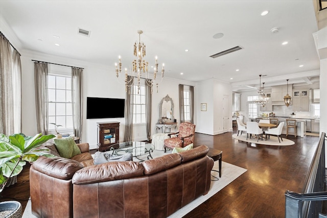 216 Morningside Park St, Houston, TX 77024 - living area featuring a chandelier, dark wood-style flooring, a fireplace, crown molding, and recessed lighting