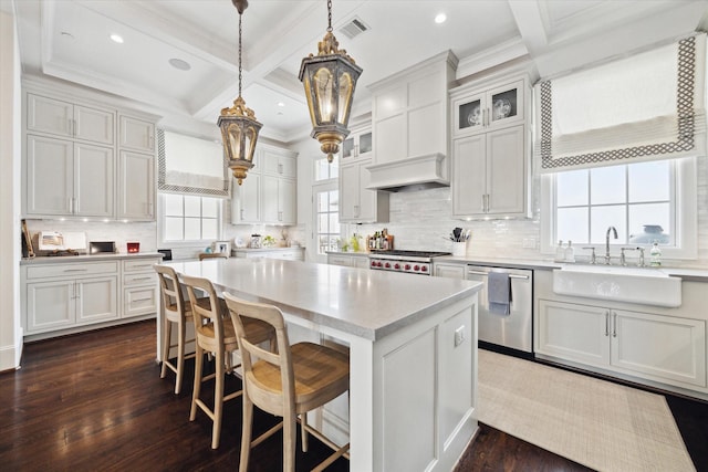 216 Morningside Park St, Houston, TX 77024 - kitchen featuring dishwasher, a sink, light countertops, ornamental molding, and a kitchen island