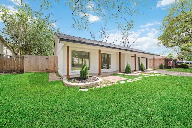 2618 Pine Village Dr, Houston, TX 77080 - view of front of home featuring concrete driveway, a garage, brick siding, and a gate