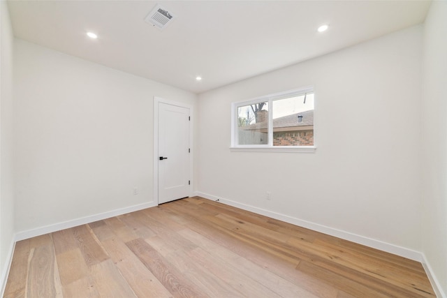 2618 Pine Village Dr, Houston, TX 77080 - spare room with light wood-style flooring, baseboards, and recessed lighting