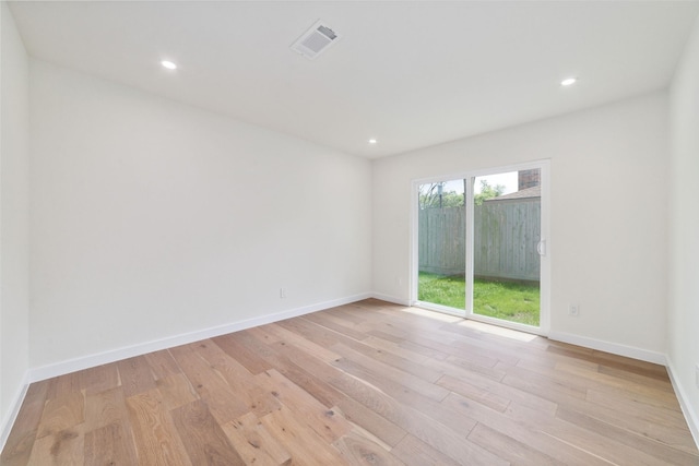 2618 Pine Village Dr, Houston, TX 77080 - spare room featuring light wood-type flooring, baseboards, and recessed lighting