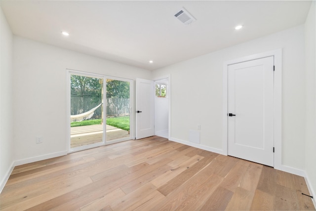 2618 Pine Village Dr, Houston, TX 77080 - unfurnished room with light wood-type flooring, baseboards, and recessed lighting