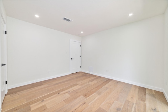 2618 Pine Village Dr, Houston, TX 77080 - unfurnished room with light wood-type flooring, baseboards, and recessed lighting