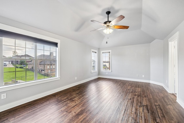 12336 Pebble View Dr, Conroe, TX 77304 - spare room featuring a ceiling fan, dark wood-type flooring, baseboards, and lofted ceiling