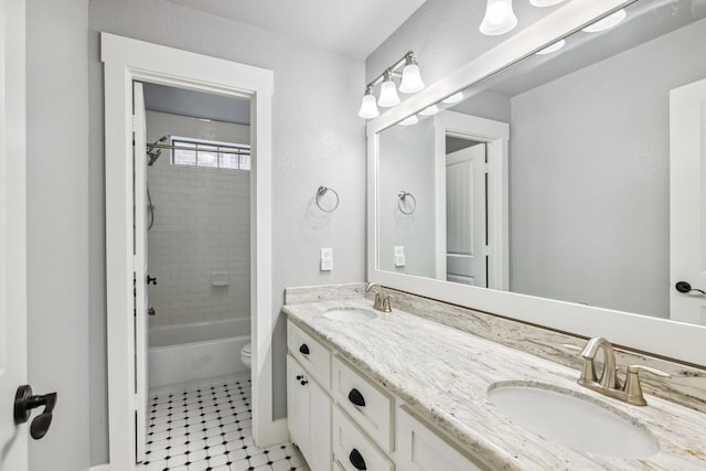 12336 Pebble View Dr, Conroe, TX 77304 - bathroom with double vanity, toilet, tub / shower combination, and tile patterned flooring