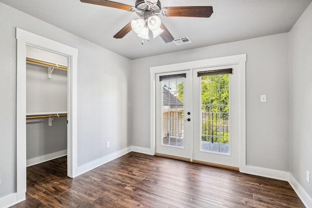 12336 Pebble View Dr, Conroe, TX 77304 - unfurnished bedroom featuring french doors, access to exterior, wood finished floors, baseboards, and a closet