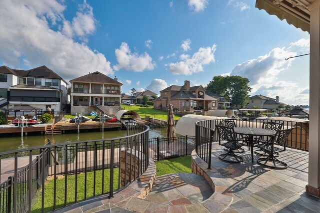 12336 Pebble View Dr, Conroe, TX 77304 - view of patio / terrace featuring a residential view and a water view