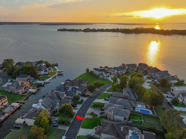 12336 Pebble View Dr, Conroe, TX 77304 - aerial view at dusk of a water view and a residential view