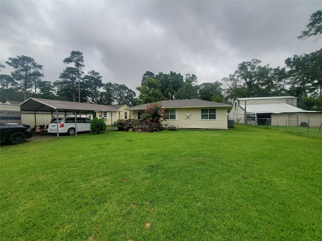 24027 Spears Cir, New Caney, TX 77357 - ranch-style home with a detached carport