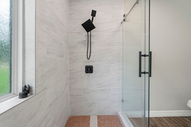 15608 Navajo Trl, Willis, TX 77378 - bathroom with a shower stall and toilet