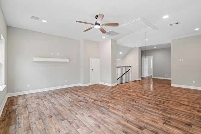 15608 Navajo Trl, Willis, TX 77378 - empty room featuring attic access, ceiling fan, wood finished floors, recessed lighting, and baseboards