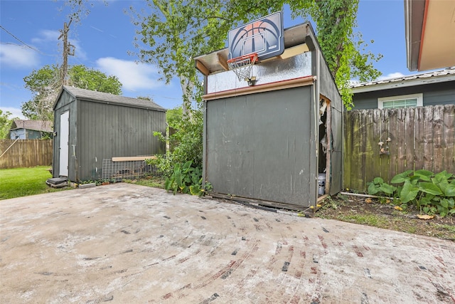 2198 N Winfree St, Dayton, TX 77535 - view of shed with a fenced backyard