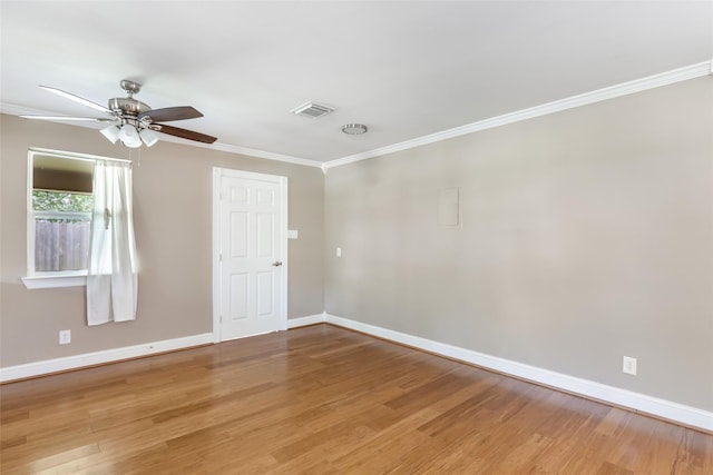 2198 N Winfree St, Dayton, TX 77535 - unfurnished room featuring ornamental molding, ceiling fan, baseboards, and light wood-type flooring