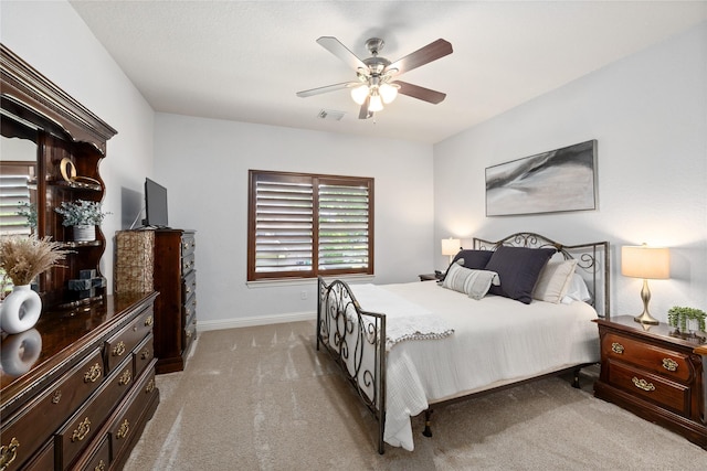 11 Bees Creek Ct, Missouri City, TX 77459 - bedroom featuring light carpet, baseboards, and a ceiling fan