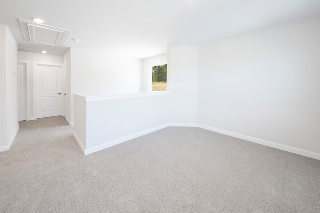 6179 White Spruce Dr, Conroe, TX 77304 - unfurnished room with attic access, carpet floors, baseboards, and recessed lighting