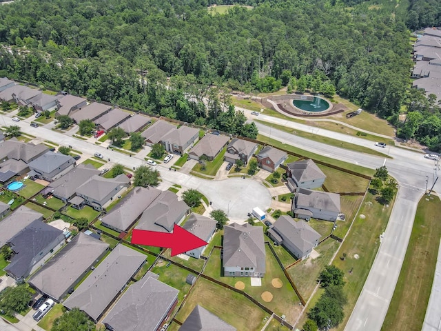 30507 Woodson Trace Dr, Spring, TX 77386 - aerial view of property and surrounding area featuring nearby suburban area and a heavily wooded area